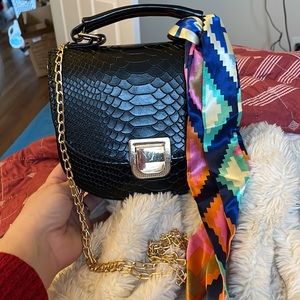 Little black purse, brand new.